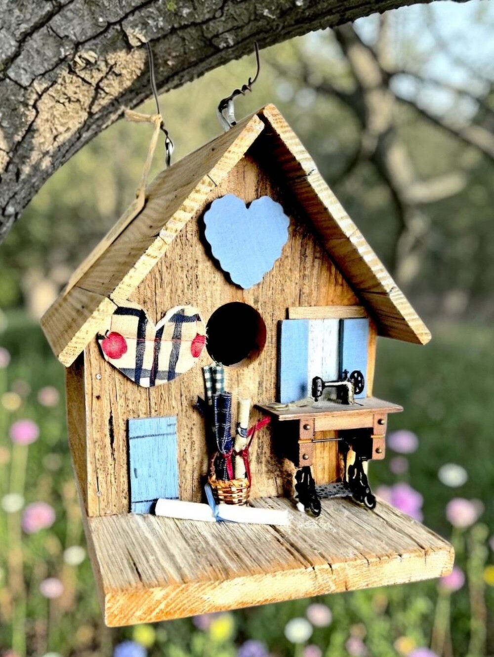 Handmade Wooden Birdhouse with a Sewing Machine Bigger Than the Front Door!